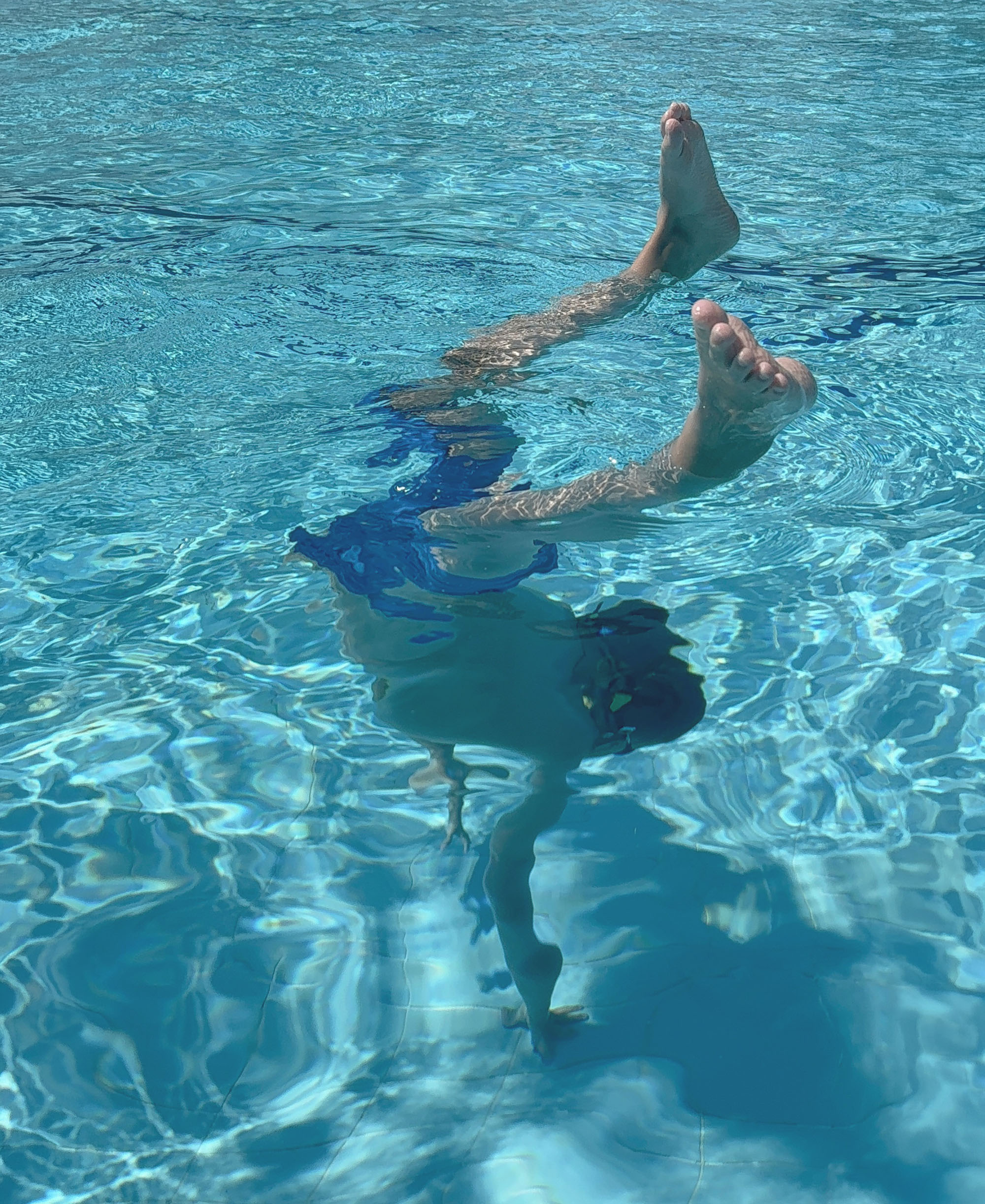 child in a swimming pool. swimming lessons, aqua aerobics, or be